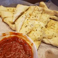 Big Dipper · Italian bread topped with melted mozzarella cheese, freshly chopped garlic and spices. Serve...