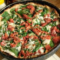 Build Your Own Large Pizza · Build your own large thin crust, deep dish, or stuffed pizza. Pick any three ingredients.
