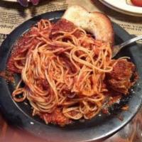 Spaghetti Pasta · Complete with two meatballs, our homemade spaghetti sauce, and 1 piece of garlic bread.