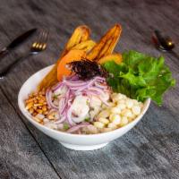 Ceviche Mixto · Fish, shrimp, octopus, and squid. Seafood and fish marinated in lemon. Served with onions, c...