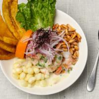 Ceviche de Camarones · Shrimp. Seafood and fish marinated in lemon. Served with onions, cilantro, and sweet potatoes.