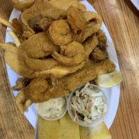 Fried Catfish and Shrimp Plate · Large tail-on shrimp, strips of fried catfish served with seasoned fries, coleslaw.