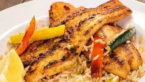 Blackened Catfish · Sauteed in olive oil, lemon, butter, garlic with Cajun spices and baton cut vegetables. Serv...