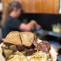 Big Breakfast with 12 oz. House Coffee · 2 eggs, 2 meats of your choice, house potatoes, toast or biscuit.