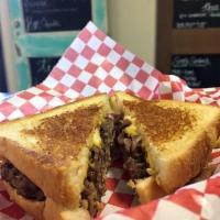 Patty Melt Burger · 100% ground beef patty, grilled red onions, Texas toast, American cheese and mayo.
