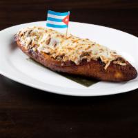 Lanchita de Regla · Sweet fried plantain stuffed with our delicious ground beef and topped with melted cheese.