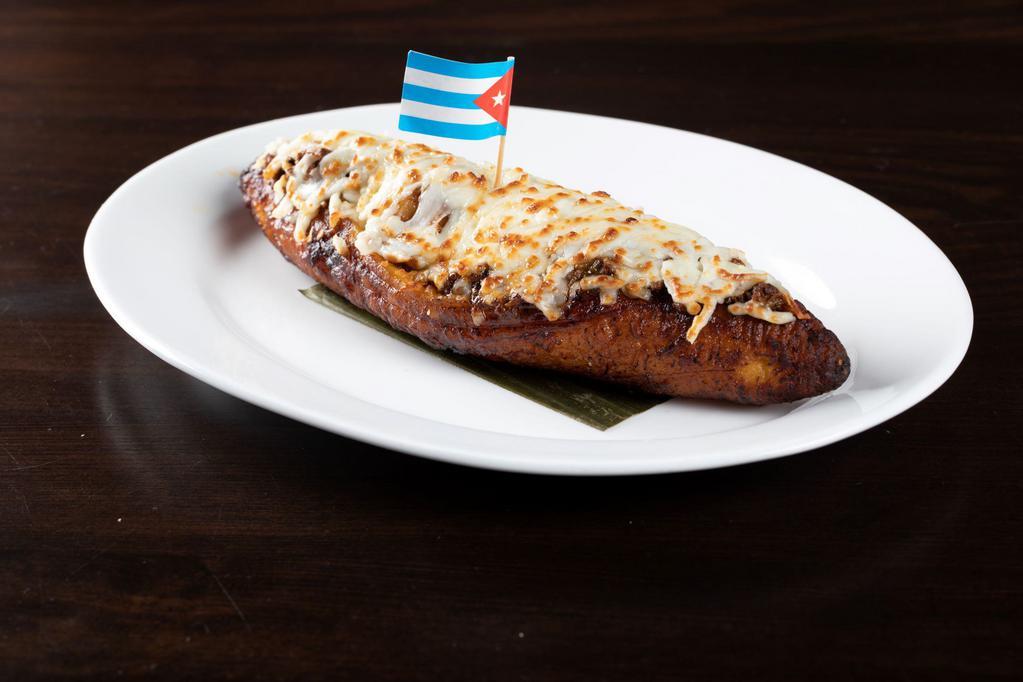 Lanchita de Regla · Sweet fried plantain stuffed with our delicious ground beef and topped with melted cheese.