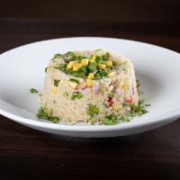 Ensalada de Quinoa con Vegetales · Quinoa salad with vegetables. Fresh quinoa with house dressing and tossed with fresh shucked...