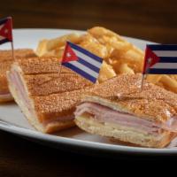  Sandwich de Jamon con Queso · Ham and Swiss cheese on authentic pressed Cuban bread served with french fries.