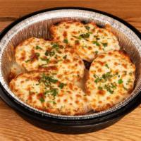 Garlic Bread · Topped with melted mozzarella.