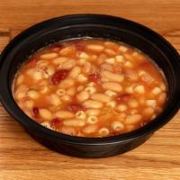 Pasta e Fagioli · Ditalini pasta and cannellini beans served in crushed plum
tomato and roasted garlic broth.