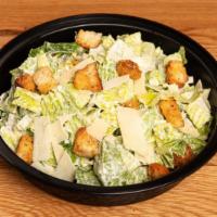Small Caesar Salad · Romaine lettuce, garlic croutons, parmesan shavings & dijon
Caesar salad