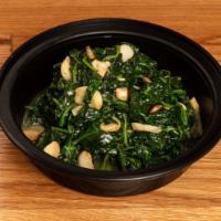 Side of Spinach · Sauteed in garlic and oil.