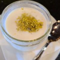Rice Pudding · Topped with pistachio.