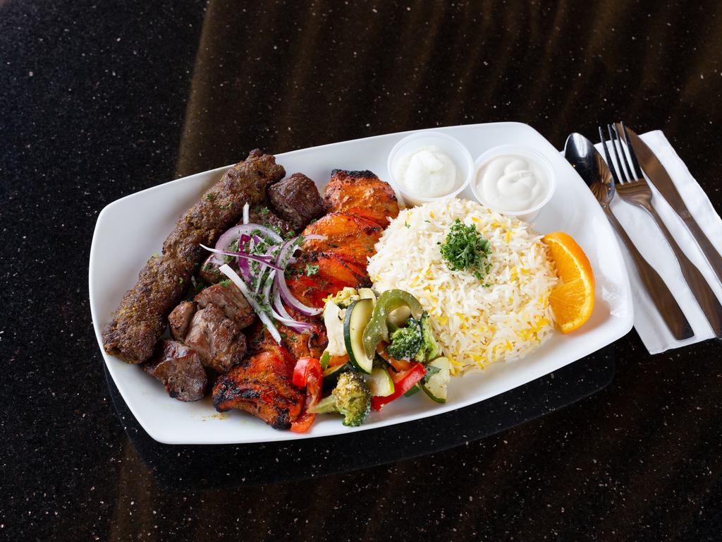 Combo Shish Kabob · Eager to try them all? Then treat yourself to our juicy lamb, chicken and kafta shish kabob. Served with basmati rice and sauteed vegetables. Gluten free. Halal.