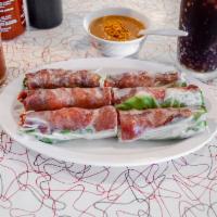 2. Spring Rolls with Charbroiled Pork · Heo nuong cuon.