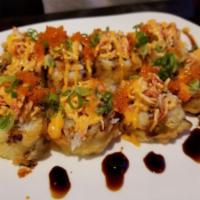 #1 Roll · Salmon, cream cheese and avocado. Topped with spicy crab mix. Drizzled with our signature sw...