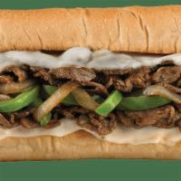 PHILLY CHEESESTEAK · Sirloin Steak, Provolone,
Caramelized Onions & Sautéed Bell Peppers