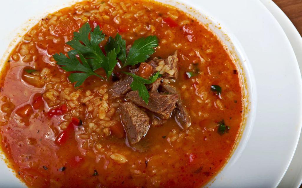 Kharcho Soup · Georgian style soup, natural lamb broth with Lamb ribs and rice, carrots.