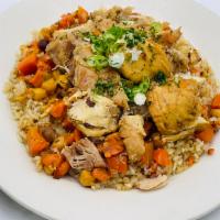 Plov with Halal Chicken Thigh  · Rice pilaf cooked in a kazan with chunks of halal chicken thigh, carrots and chickpeas, topp...