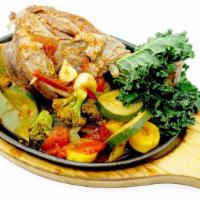 Braised Lamb Chank with Mashed Potato  · Lamb shank are slowly simmered in central Asian style. Served with mashes potato and organic...