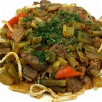 Kovurma Lagman · Fried hand pulled noodles with beef and Asian vegetables.