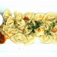 Vareniki with Potatoes · Ukrainian classic pierogi, loaded with cheesy potatoes and an easy melt in your mouth homema...