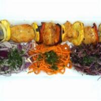 Chilean Seabass  · Large skewered kebab grilled on fruit seed wood charcoal served with organic home fries, mar...