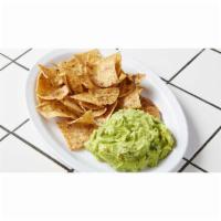 Guacamole con Totopos · The Tacombi clásico. A smooth blend of Haas avocados, jalapeño, red onions, and lime juice m...