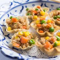 MTK Golden Cup (6) · Thai Kratong Thong is seasoned /
minced chicken with carrots, peas and
sweet corn in a cri...