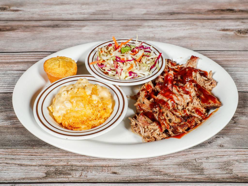 Memphis Pulled Pork Platter · A Southern classic. Smoked up to 17 hours, our lean succulent pork is as tender as can be.