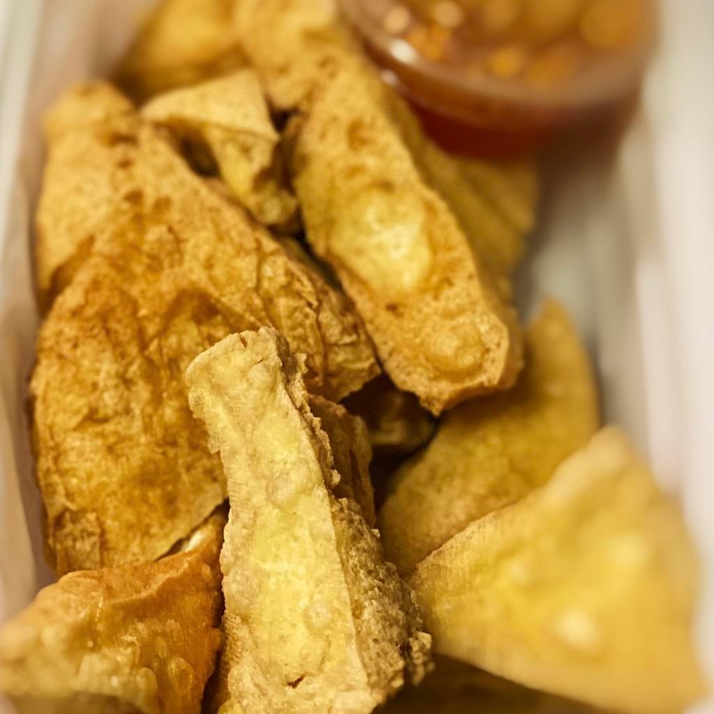 A1. Tao Hoo Taud · Fried bean curd served with sweet chili sauce topped with ground peanuts. Extra dipping sauce will be an +$1