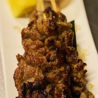 A11.Moo Ping · Pork skewers marinated in Thai herbs served with jeaw sauce. Extra dipping sauce will be an ...