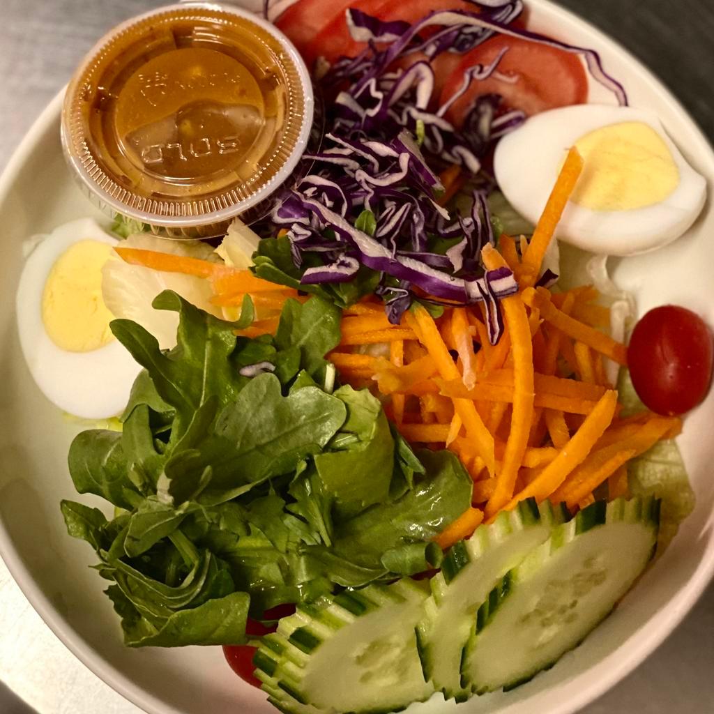 Y1. Thai Salad · Carrots, cucumbers, lettuce, red cabbage, tomatoes and a hard-boiled egg with homemade peanut sauce dressing.