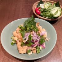 Y5. Larb Tofu  · Ground tofu mixed with peanuts, red onion, lime juice and Thai herbs. Hot and spicy.