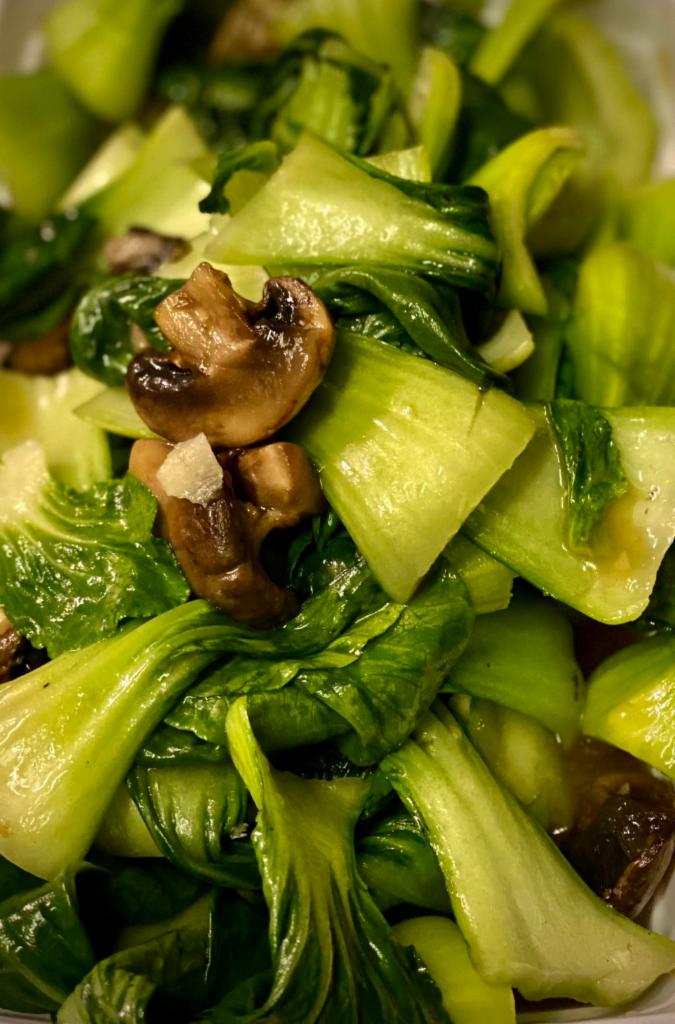 V4. Pad Bok Choy · Stir-fried bok choy with garlic and mushrooms. Served with side of jasmine rice. *PLEASE NOTE: Can not be made spicy request hot sauce in sauces section.*