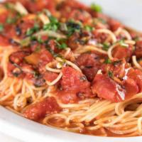 Capellini Pomodoro · Angel hair with a sauce of chunky fresh tomatoes, basil, garlic, and olive oil.