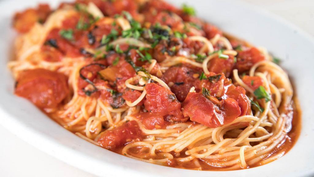 Capellini Pomodoro · Angel hair with a sauce of chunky fresh tomatoes, basil, garlic, and olive oil.