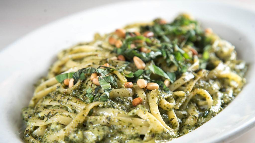Linguine Pesto-Cream · Long, flat strands with a puree of basil, pine nuts, Parmesan, and olive oil and a splash of cream.