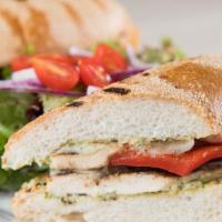 Grilled Chicken Sandwich · Comes with grilled red bell peppers, fontinella cheese, and pesto-mayo. Served with a side s...