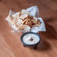 Smoky Grilled Queso · Pepper jack, queso fresco, roasted tomato salsa, pico