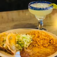2 Taco Plate · Served with Spanish rice and beans.