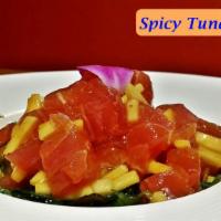 Spicy Tuna Salad · Tuna and mango mixed with sweet chili sauce, serves on seaweed salad. contains: sesame seed,...