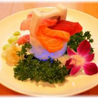 Sashimi Appetizer  · 7 pieces. Tuna (2 pieces), albacore (2 pieces) & salmon (3 pieces)

