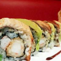 Super Dragon Maki · 10 pieces. tempura shrimp, avocado, and crab meat inside, topped with eel, avocado, and swee...
