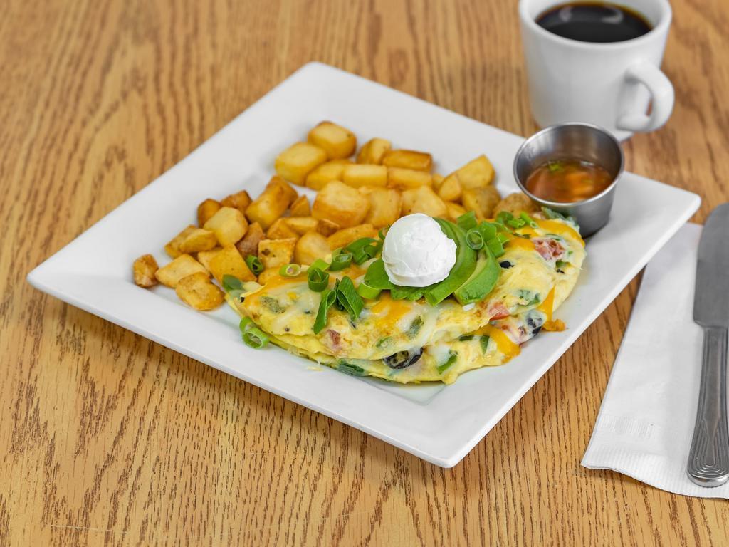 Spanish Omelet Breakfast  · Cheddar cheese, green peppers, ripe olives, and tomatoes, with melted cheddar cheese, topped with salsa, green onions, fresh avocado and sour cream.
