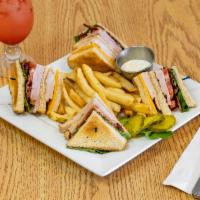 Nayhely's Special Clubhouse Sandwich  Lunch  · Roasted turkey, ham, crisp bacon, cheddar cheese, lettuce, tomatoes, and mayonnaise, on whit...
