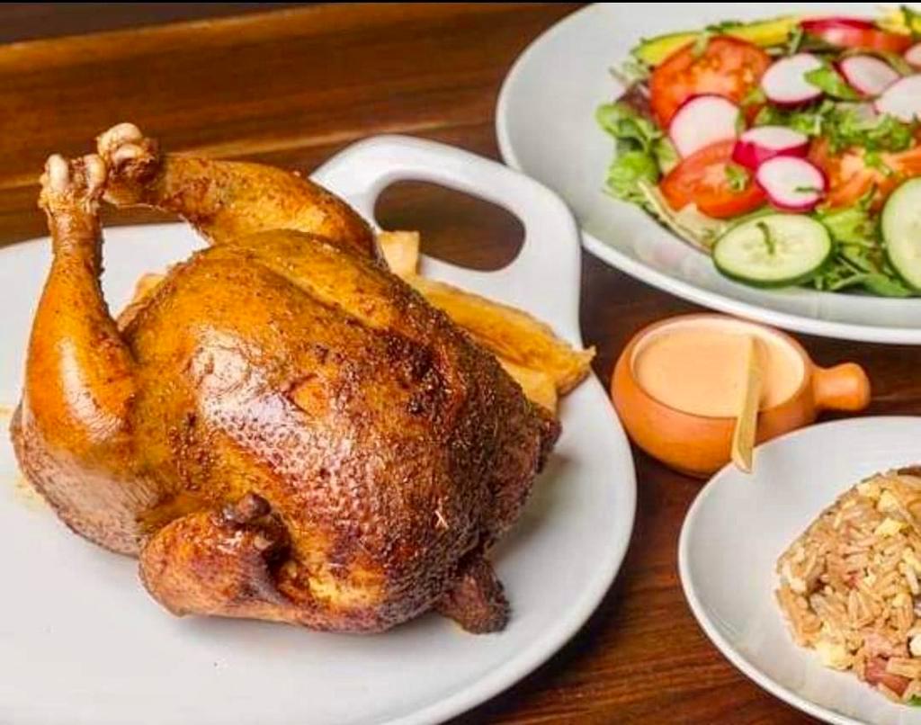 Family style 1 Chicken · 1 whole chicken, Salad, choice of yuca or french fries and 1 Side