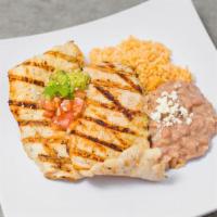 Pechuga Asada · Boneless chicken breast grilled and served with guacamole, rice, beans, salsa and tortillas.