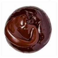 Valrhona Chocolate Cake Donut · Cake donut topped with premium French chocolate and finished with a swirl of chocolate ganac...